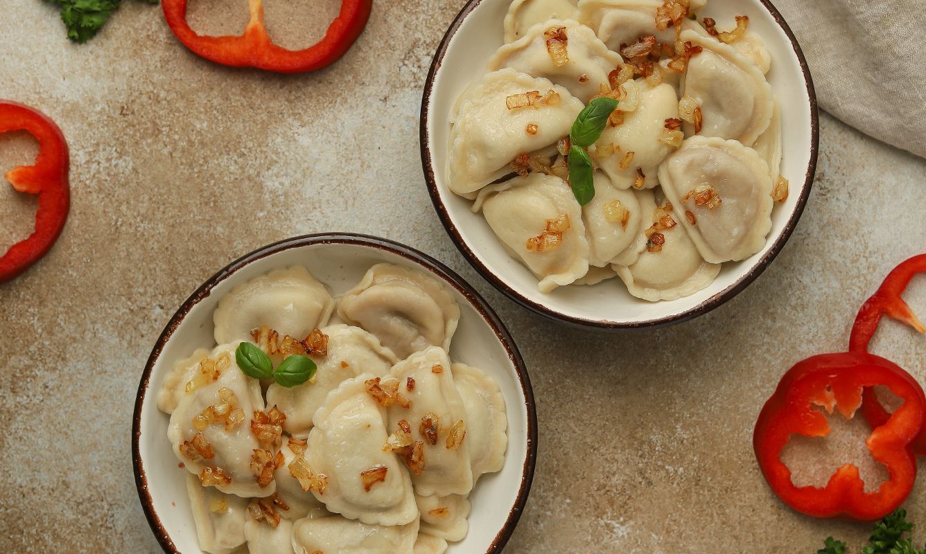 Varenyky with golden onions and fresh herbs